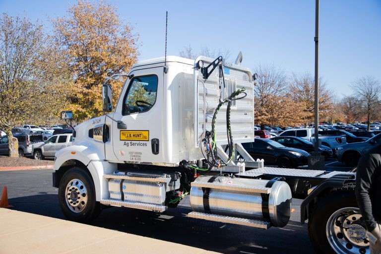 J.B. Hunt Ag Services truck in a parking lot at the J.B. Hunt corporate office.