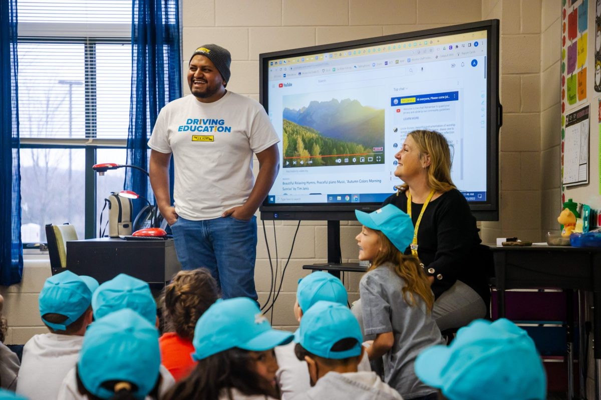 J.B. Hunt driver delivers supplies to a classroom.
