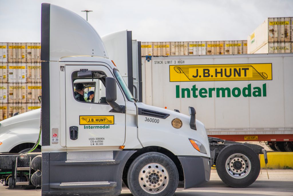 J.B. Hunt intermodal cabs parked in front of J.B. Hunt containers.