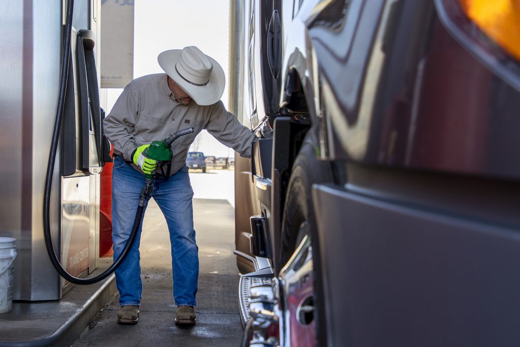 Owner operator fuels his truck.