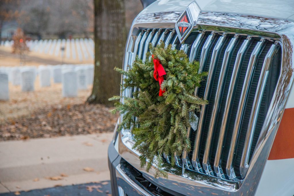 J.B. Hunt truck delivers wreaths to a national cemetery for Wreaths Across America.
