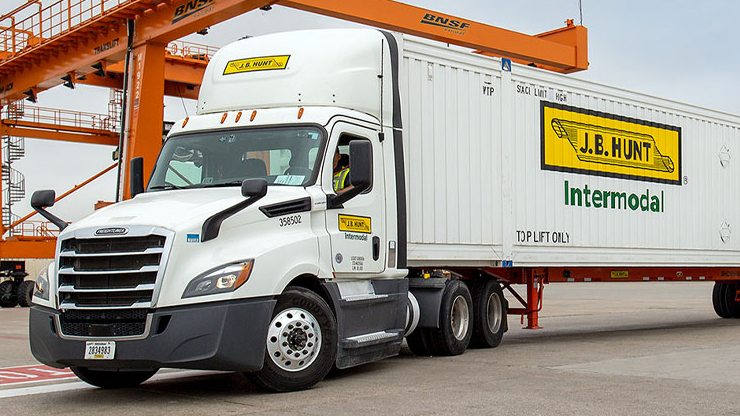 j.b. hunt intermodal tractor trailer at a loading dock