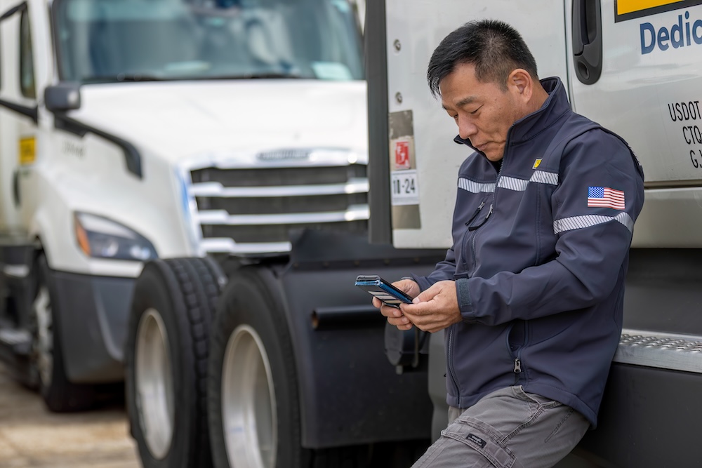 Driving looking at phone outside of truck