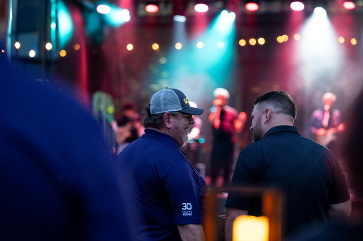Drivers listen to a band during the million mile recognition
