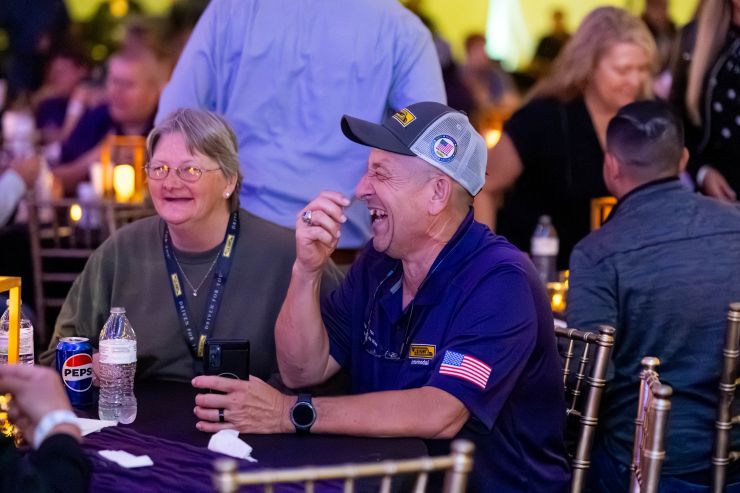 Million mile drivers at tables during recognition