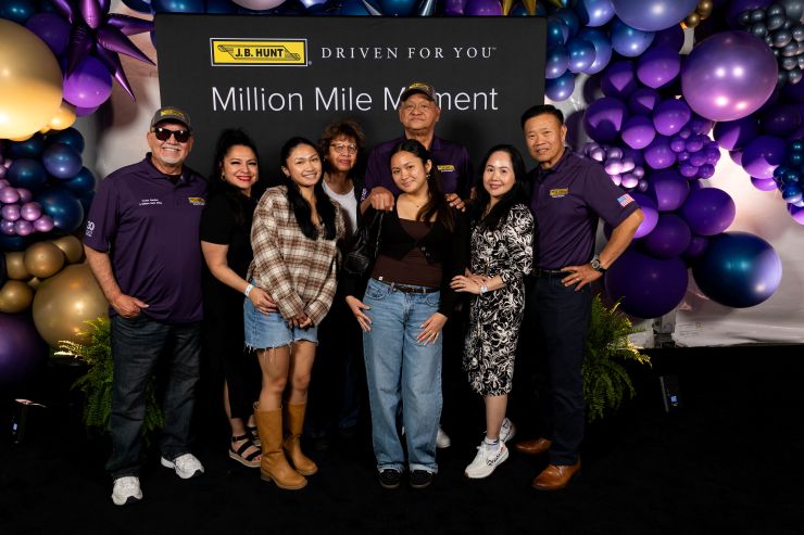 million mile driver poses with family